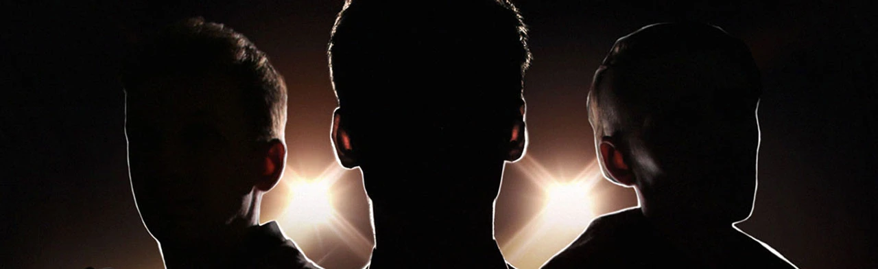 Три товарища